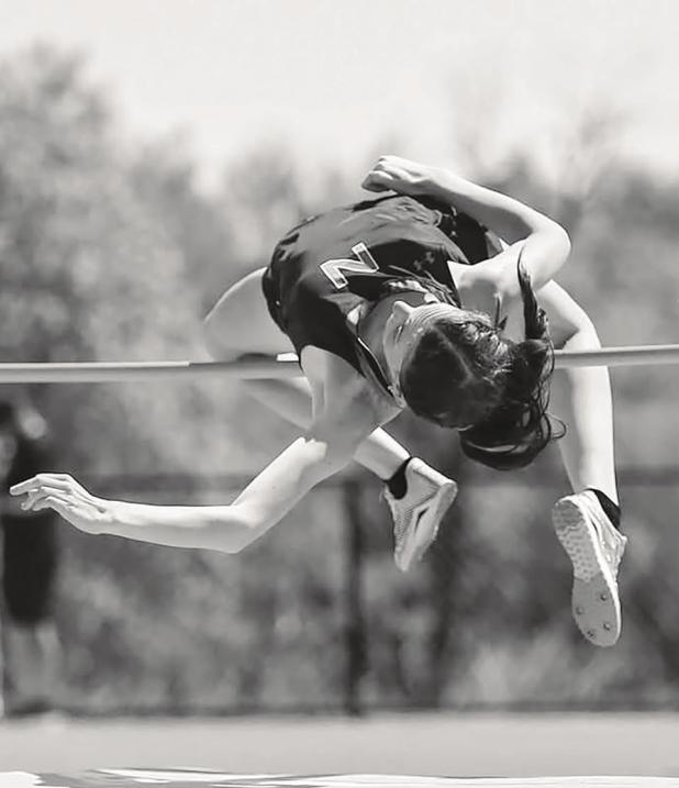 NHS Ladycat Aubree Clayton moves on to Regionals in high jump. Photo by Will Sadler