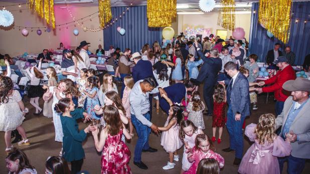 DJ Rad Dad had the dance floor packed with his lively music selections.