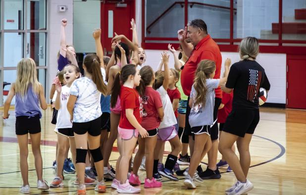 New volleyball coaches hold