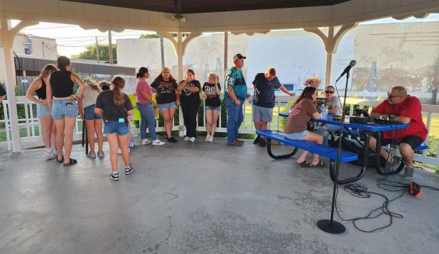 Friends, family gather for candlelight vigil for OHS student Avery Green