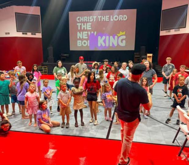 Rodney Nantz, co-director of The Refuge, addresses kids during the final week of summer programs. Photo provided by The Refuge