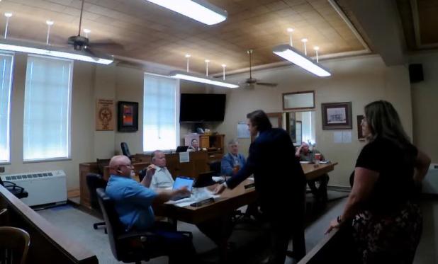 Olney Chamber of Commerce Treasurer Dan Branum and Chamber director Kimberly Smith meet with Young County Commissionres on April 13 to request funds for Olney in America. Screen capture