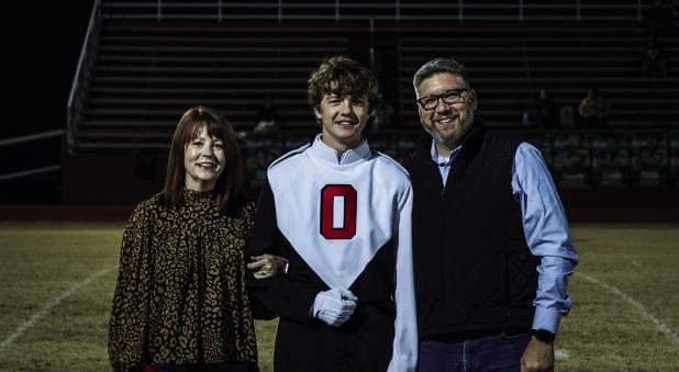 Sawyer Edgington Escorted By: Chad And Melissa Edgington Activities: POOHS - 4 years, cross country, marching Band, UIL-Speech and Debate, OAP. After Graduation: Attend Texas A&amp;M to major in International Affairs.