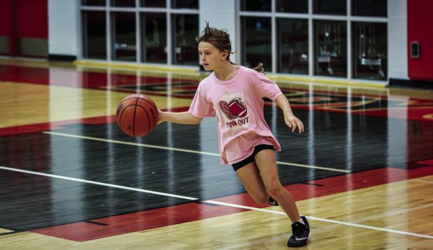 A mighty little Lady Cub showed up to basketball summer camp to show the Cubs how it’s done! Photo by Will Sadler