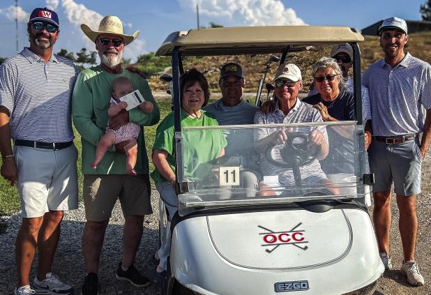 The McClatchy Golf Tournament kicked off the last weekend in May. L-R: Mace McClatchy, Kent McClatchy (holding granddaughter Gracie), Glenda Bowen, Robbie Little, Jim Bowen, Syndal McClatchy, Chase McClatchy, Cole McClatchy. Kent and Syndal are the aunt a