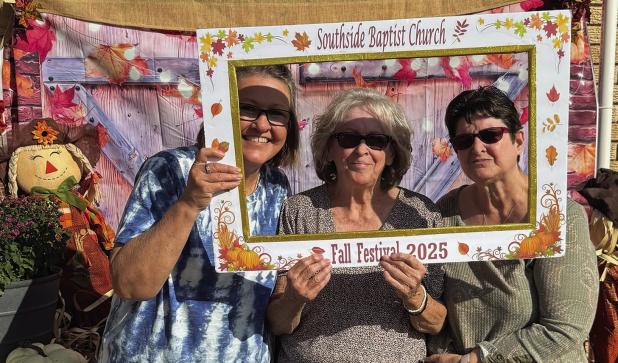 Southside Baptist Church held its Harvest Festival last weekend. Above: Kelly Echols, Carol Dunsworth and Tresa Dunsworth. Below: Glenda Horry and Candy Blair man a table. Photos by Candy Blair