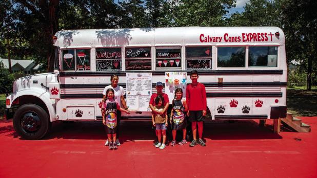 Shown are Calvary Cones owner Mari Behrens [upper left] with her children, who are her helpers: Agape, RJ, Bliss, Grace, and Johanna. Photo by Will Sadler