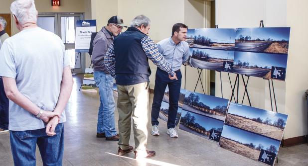 Olney Mayor Rue Rogers (R) and Olney Hamilton Hospital board member Ron Rogers (L) examine renderings of the proposed site of a data center slated for southern Young County. The data center is expected to bring a huge infusion of tax revenue to the hospit