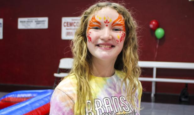 All smiles! Caroline Jeske of Olney shows off her bright face paint at The Refuge’s 10th anniversary celebration on Saturday. Photo by Gina Keating