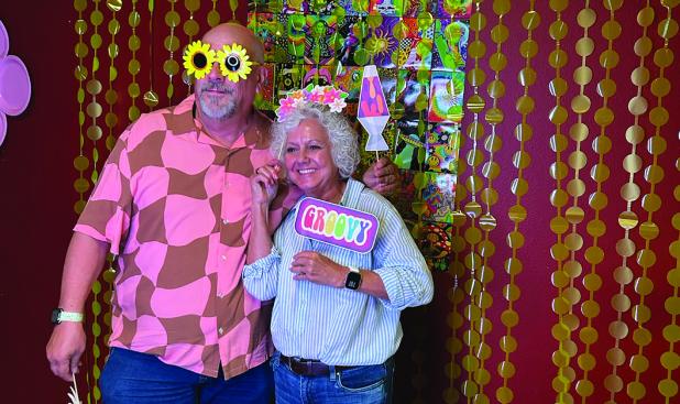Spencer and Debbie Key posed for photos at the Senior Cub Center dance ot the PhotoBomb booth. Photo by Candy Blair