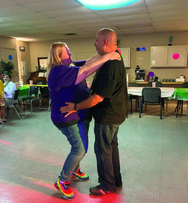 The Olney Senior Cub Center sponsored a 1960s-themed dance, following the success of previous dances organized by outgoing activities director Candy Blair. Here, Chris and Heather Garcia hit the floor at the Cub Center on Friday, Sept. 19. Photo by Candy