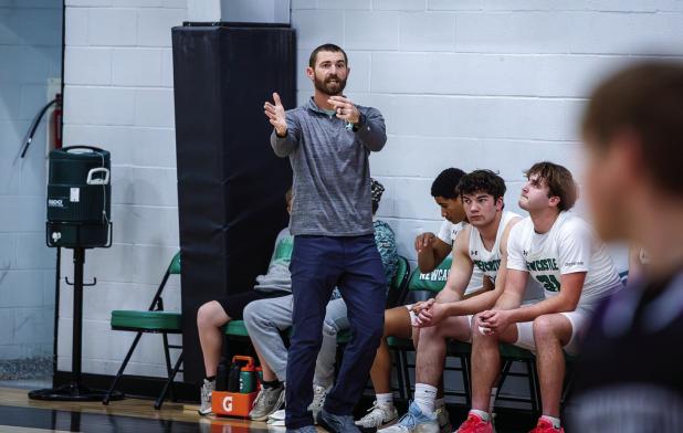 Bobcat Coach James King shows his passion for the team, giving instructions from the sideline. Photo by Will Sadler