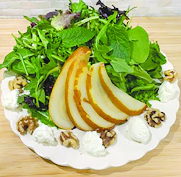 Mint-arugula salad with goat cheese and poached pears