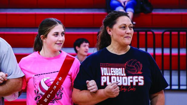 Lady Cub #12 Morgan Simmons escorted by mom Calli Simmons during Senior Night. Photo by Will Sadler