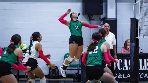 Ladycat #11 Emma Hawkins goes up for a kill shot during their match up with the Lady Pirates. Photo by Will Sadler