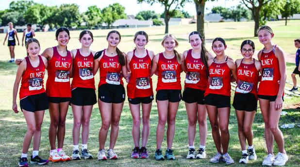The Olney Junior High Lady Cub X-Country team battled through the OHS Invitational earning a first-place finish. Team names available at press time: Clara Symank, Ella Richards, Libby Lane and Taylor Cadotte. Congratulations, Lady Cubs! Photo by Will Sadl