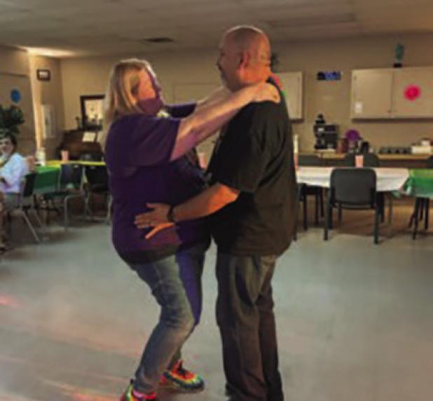 (Right): The Olney Senior Cub Center sponsored a 1960s-themed dance, following the success of previous dances organized by outgoing activities director Candy Blair. Here, Chris and Heather Garcia hit the floor at the Cub Center on Friday, Sept.19. Photo b