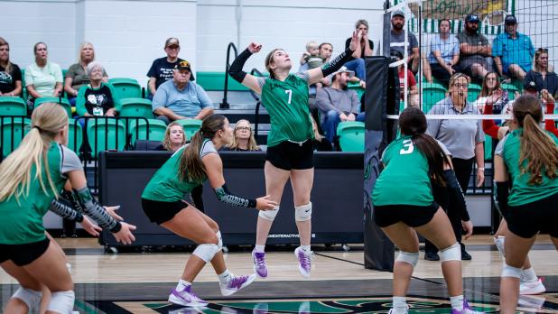Ladycat #7 Kinzlee Sweat sends a kill shot across the net to Lady Rabbit defenders. Photo by Will Sadler