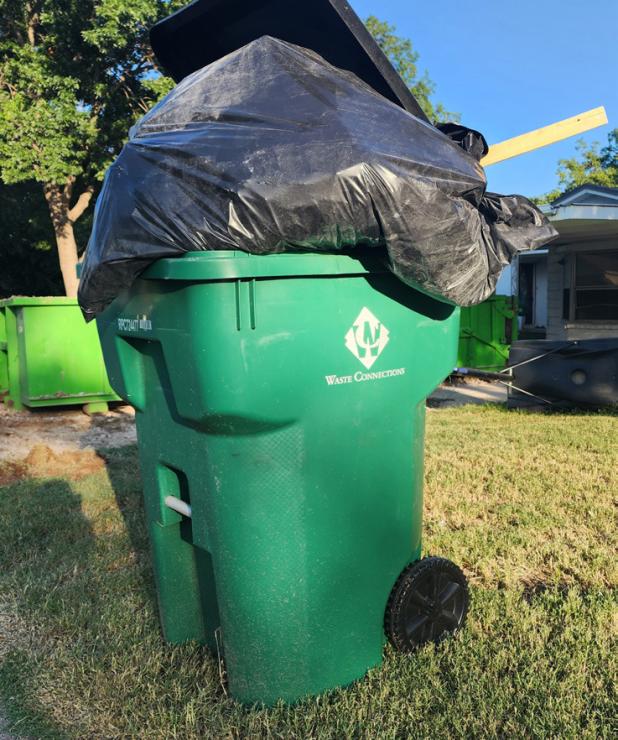 Olney not sold on new trash cans