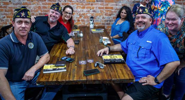 Military and Blackwater veterans came to Olney from all over Texas to support the men of Raven 23 at an Aug. 17 book signing sponsored by the Olney Enterprise at Hudson’s on Main. (L-R): Olney American Legion Vice Commander Eric Loggins, District Zone C