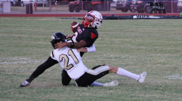 Cubs #2 Jamarcus Collins is brought down by an Archer City defender during one of several receptions from quarterback Tucker Cortinez in the Sept. 18 Homecoming game at Cub Stadium. Collins was recognized as the Scout Team Player of the Game. Photo by Gin