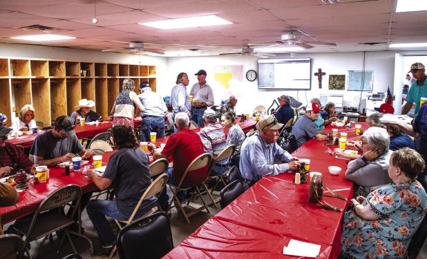 The annual NVFD fish fry packs three large rooms and fills countless to-go orders. Attendees may have come for some delicious catfish but went away with great memories. Photo by Will Sadler