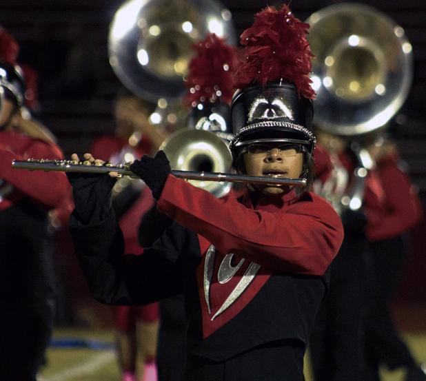 The Olney High School Band takes the field one last time during the football season finale at Seymour.