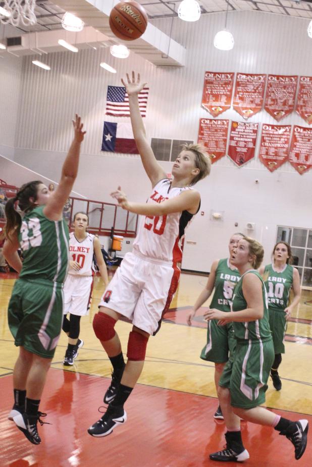 Olney senior guard Kodie Scott sinks a shot against Newcastle.