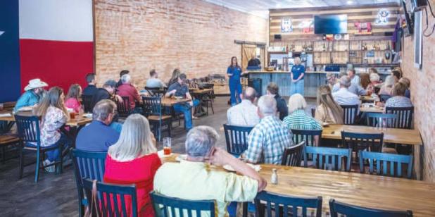 Olney Chamber members gathered at Hudson’s on Main on Thursday, April 16 for their Spring Quarterly Luncheon and to hear from Kaci McKinzie, executive director Virginia’s House about their programs and need for volunteers and donations. Photo by Will Sadler