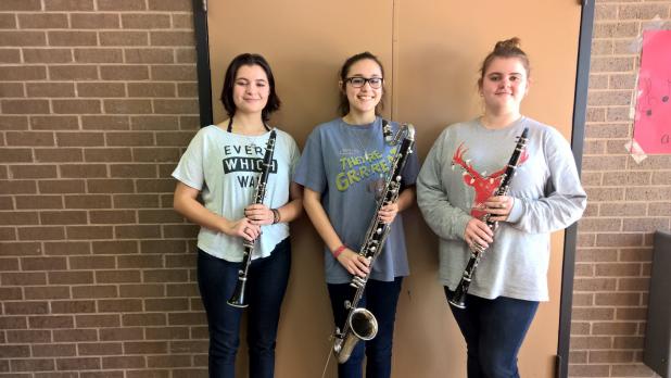 Shown here are Olivia Kulhanek, Jenny Ford and Amber McCutcheon, whose trio also qualified for state.