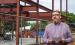 First Baptist Church of Olney Pastor Chad Edgington delivers remarks to attendees at the topping out ceremony for the church’s new $7 million education building. Photo by Gina Keating