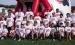 Attendees of the Kindergarten through 5th grade Cub football camp pose for a team photo. The camp for the younger athletes previews two-a-day workouts for Olney High School athletes, whose season begins in earnest in August. Photo by Will Sadler