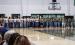 Bobcat football players, Ladycat volleyball players, and cheerleaders line up in the gym preparing to take the traditional walk through the Bobcat blowup. Photo by Will Sadler