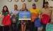 Atmos Energy employees deliver backpacks to Olney Elementary School: (L-R): Pam Hughes Pak and Carlos Trevino, Assistant Principal Kalynn Philipp, Atmos Energy’s Riley Whitson and Trevor Whitsitt. Photo provided by Atmos Energy