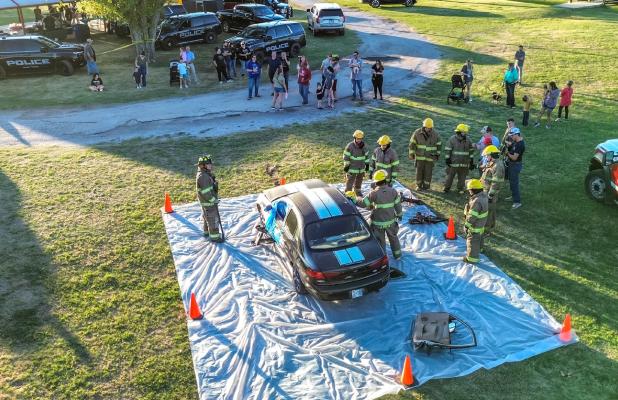 The Olney Volunteer Fire Department put on a demonstration of how the team rescues trapped victims of wrecks using tools that can pry open stuck doors and cut metal. Photo by Will Sadler