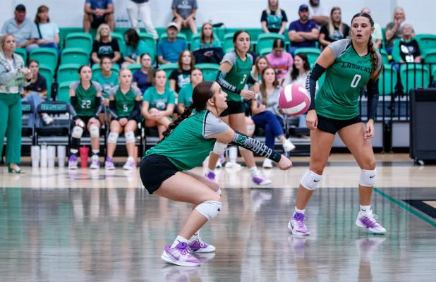 NHS Ladycat #2 Kinsey Hawkins with a dig early in the Ladycats match with the Graford Lady Rabbits. Photo by Will Sadler