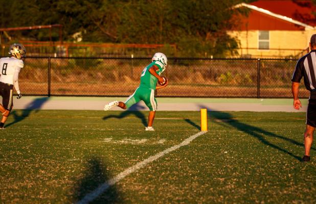 JV Bobcat #5 Hudson Hill TD raced past Jaybird defenders and came within inches of a scoring run to open the quarter. Photo by Will Sadler