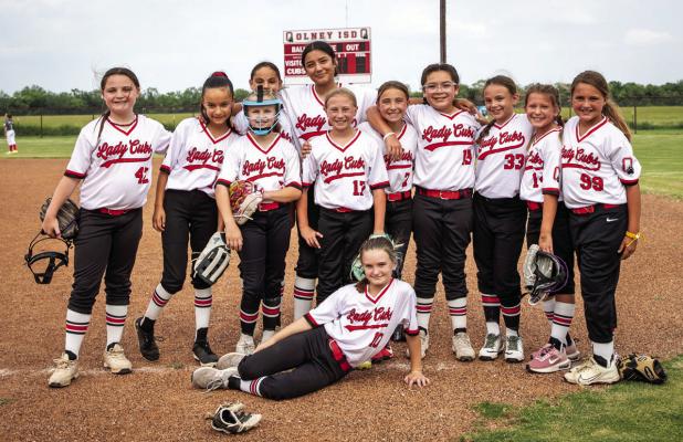 The third- and fourth-grade Lady Cubs hosted the Graham Lady Heat for summer bragging rights in softball, and the Lady Cubs came away with the win. Photo by Will Sadler