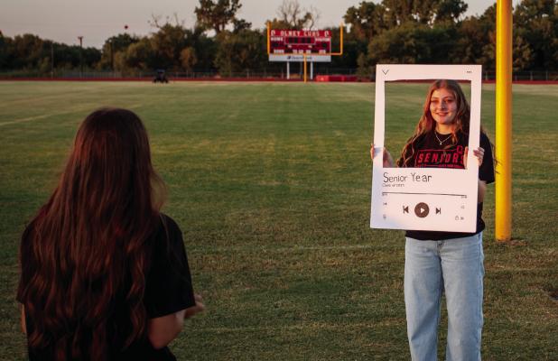 Olney High School senior Jaylee Stout enjoyed a special moment with a fellow member of the Class of 2027 at the OHS Senior Sunrise event at Cub Stadium last Friday. Story and photos on Page 6. Photo by Will Sadler