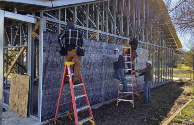 The OEDC seeks $6.1 million in USDA grants to build a modular home component manufacturing operation in Olney. The plant would be operated by Steve Bezner and Terry Horton, who tested components at this home on West Oak Street last year. Photo by Gina Kea