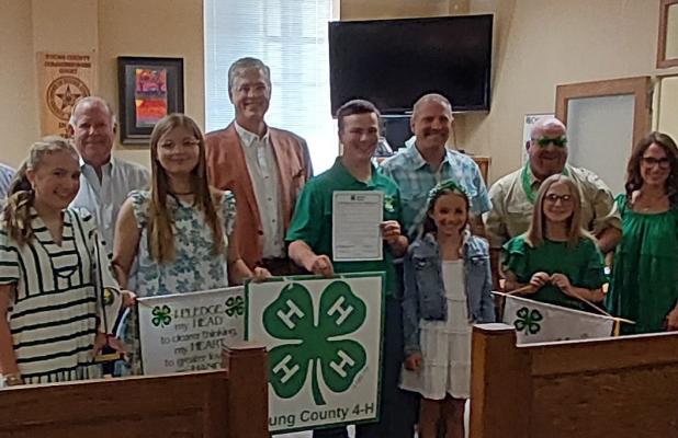 Commissioner Jimmy Wiley, Commissioner Alan Craig, Judge Win Graham, Commissioner Scott Shook, Commissioner Stacy Creswell. (Front Row): True Creel, Addison Greenwood, Kutter Gough, Haven Creel, Payton Utley, Dancey Creel, and Alli Utley. Photo by Gina Ke