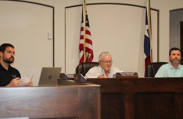 City Councilmembers put the final touches on their fiscal year 2026-2027 budget and tax rate at their Sept. 14 meeting. L-R: Councilmember Colson Ballard, Mayor Pro Tem Chuck Stennett, and Mayor Rue Rogers listen to a budget briefing from Olney Economic D