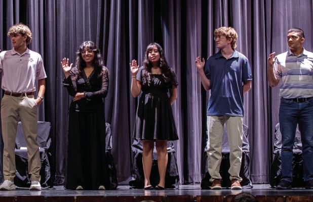 Olney High School students hold the annual National Honor Society Induction Ceremony. The NHS honors students who achieve high academic success; a 3.0 or 4.0 grade point average is necessary to be considered. Depending on the school’s standards, inducte