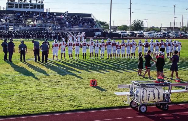 The Cubs Varsity football team line up for their first game in district play at Quanah on Friday, Aug. 28. The team lost to Quanah, 12-35. Photo by Ashley Bint