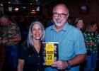 Former Olney Police Chief Dan Birbeck took time out of his schedule as police chief for the City of Vernon to attend the Aug. 17 book signing at Hudson’s on Main, sponsored by the Olney Enterprise. (L-R): Author Gina Keating, Dan Birbeck. Photo by Will