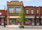 An AI-generated image of Olney’s Main Street, based on sketches commissioned by the Olney Economic Development Corp from Grossman Design Build. The rehabilitation plan for downtown and an ambitious housing plan will start in 2026, thanks to the Olney Ci