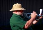 OISD Band Director Rodney Bennett, a U.S. Marine veteran, plays “Taps” at the flag retirement ceremony at the Olney American Legion on Sunday. Photo by Will Sadler