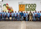 The Ministry of Helps had an army of volunteers to help with this month’s grocery delivery. Photo by Will Sadler