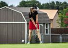 Local Olney golfer Lyndsey Miller putting in the CEMCO tourney. Photo by Will Sadler