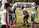 Assistant Bobcat Coach James King gives instructions and corrections to a Bobcat. Photo by Will Sadler